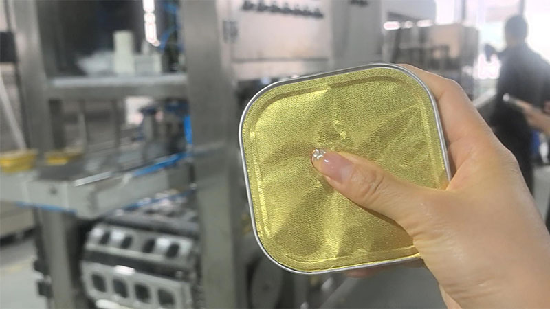 40g and 100g meat paste aluminum foil tray filling and sealing machine customzied